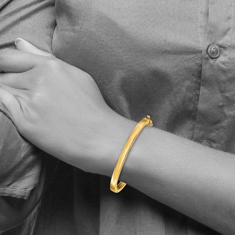 Alternate view of the 5.3mm 14k Yellow Gold Polished Solid Open Back Hinged Bangle Bracelet by The Black Bow Jewelry Co.