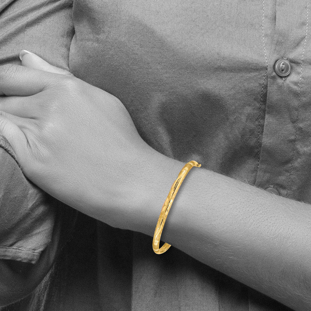 Alternate view of the 5mm 14k Yellow Gold Florentine Engraved Hinged Bangle Bracelet, 7 Inch by The Black Bow Jewelry Co.
