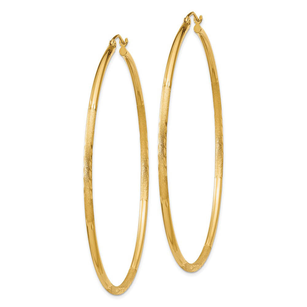 Alternate view of the 2mm x 60mm 14k Yellow Gold Satin & Diamond-Cut Round Hoop Earrings by The Black Bow Jewelry Co.