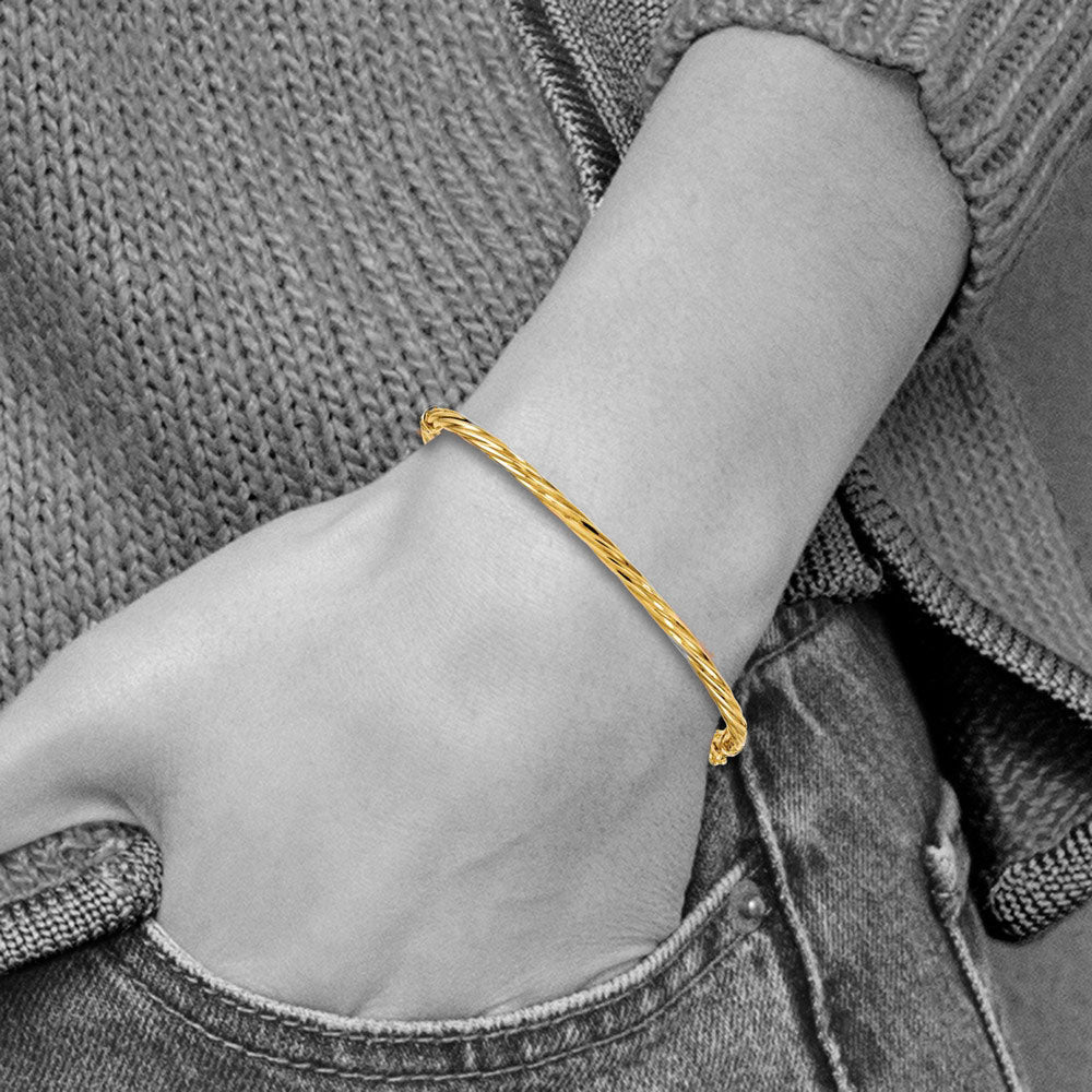 Alternate view of the 3mm 14k Yellow Gold Twisted Hinged Bangle Bracelet by The Black Bow Jewelry Co.