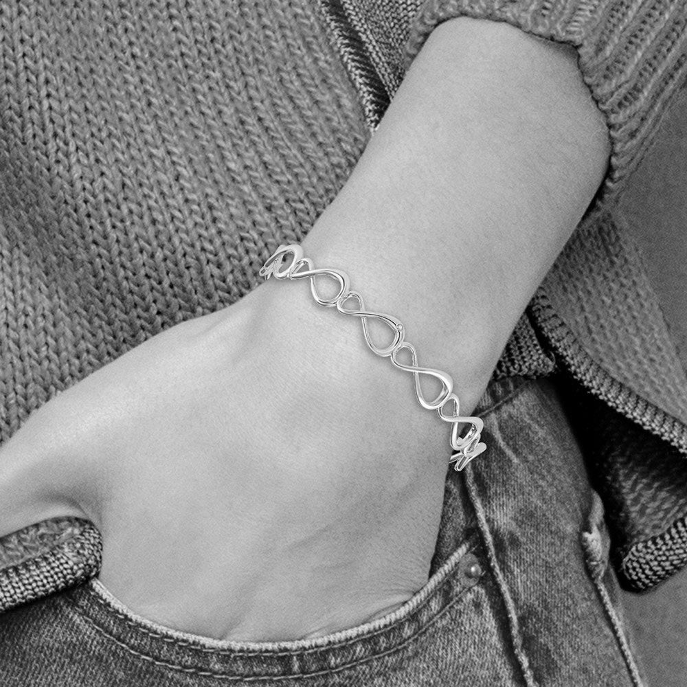 Alternate view of the Rhodium Plated Sterling Silver Diamond Infinity Bangle Bracelet by The Black Bow Jewelry Co.