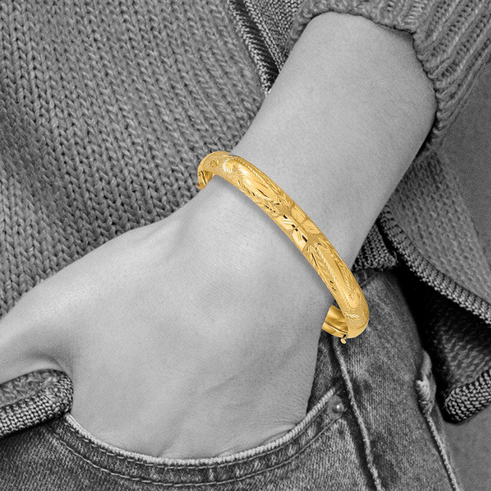 Alternate view of the 8mm 14k Yellow Gold Laser Cut Domed Hinged Bangle Bracelet, 7 Inch by The Black Bow Jewelry Co.