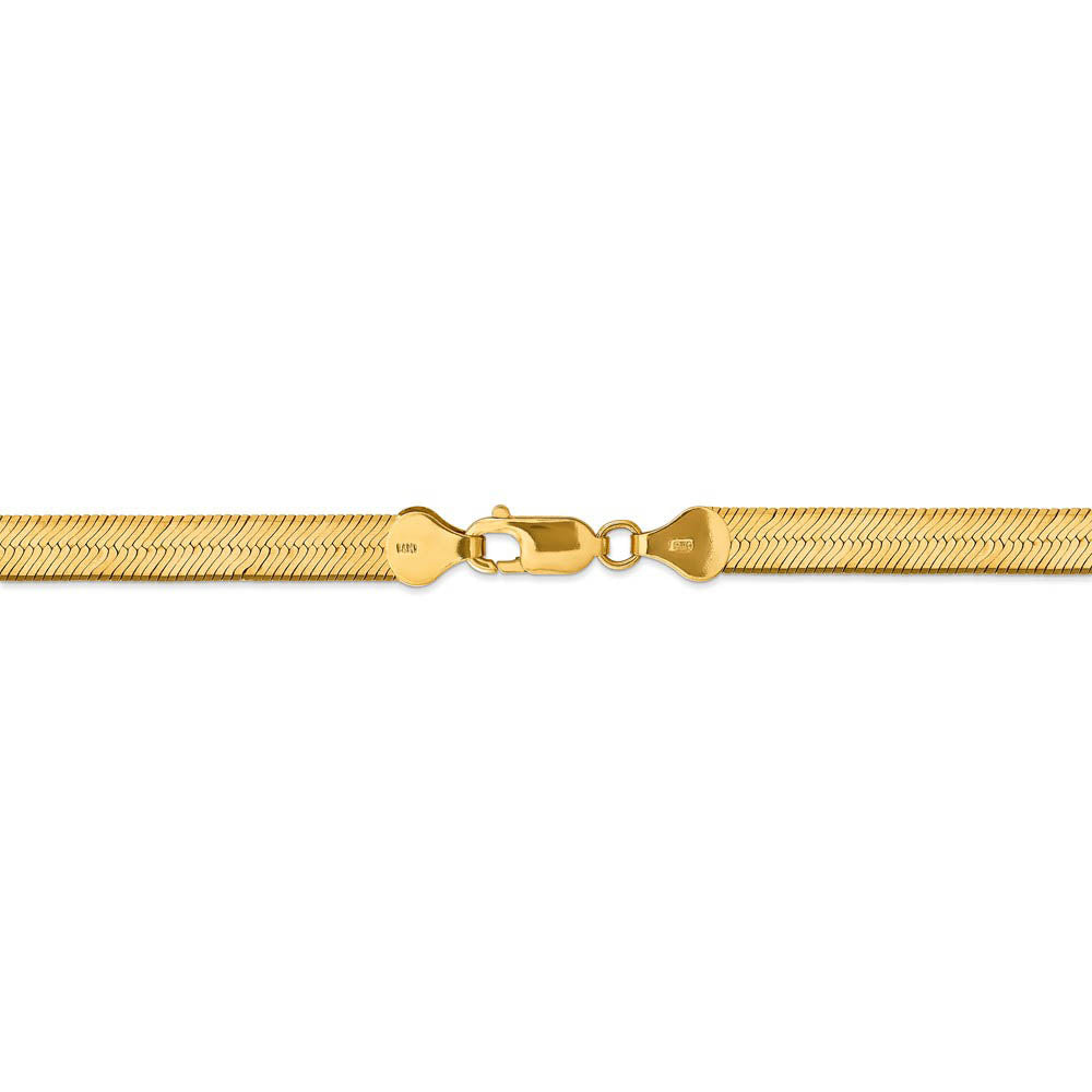 Alternate view of the 6.5mm, 14k Yellow Gold, Solid Herringbone Chain Bracelet by The Black Bow Jewelry Co.