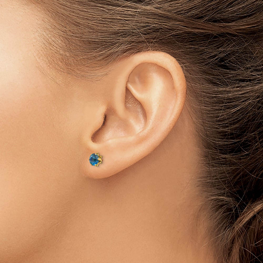 Alternate view of the Kids 5mm Synthetic Blue Topaz Birthstone 14k Yellow Gold Stud Earrings by The Black Bow Jewelry Co.