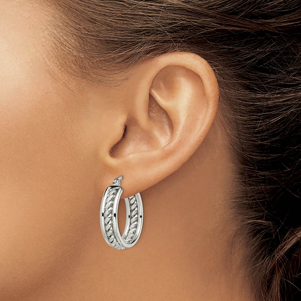 Alternate view of the 20mm Twisted Middle Round Hoop Earrings in Stainless Steel by The Black Bow Jewelry Co.