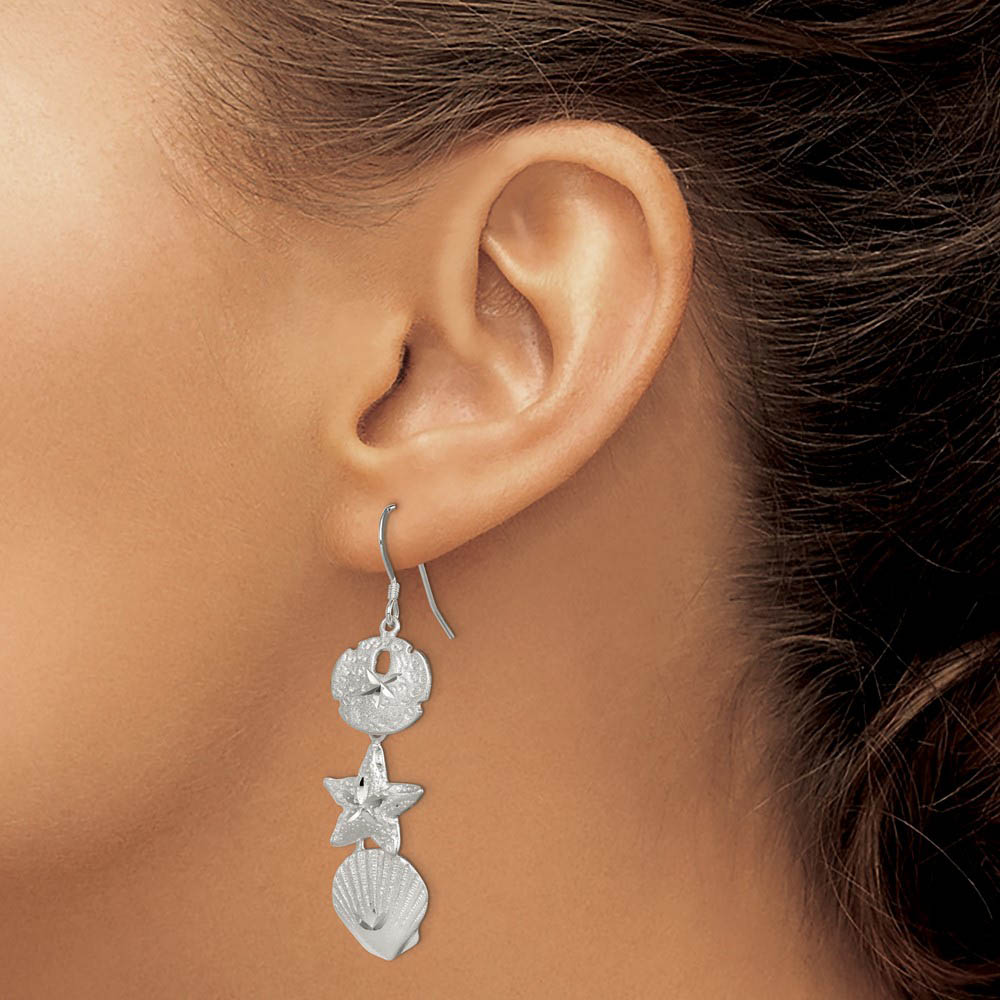 Alternate view of the Diamond Cut Sea Life Dangle Earrings in Sterling Silver by The Black Bow Jewelry Co.