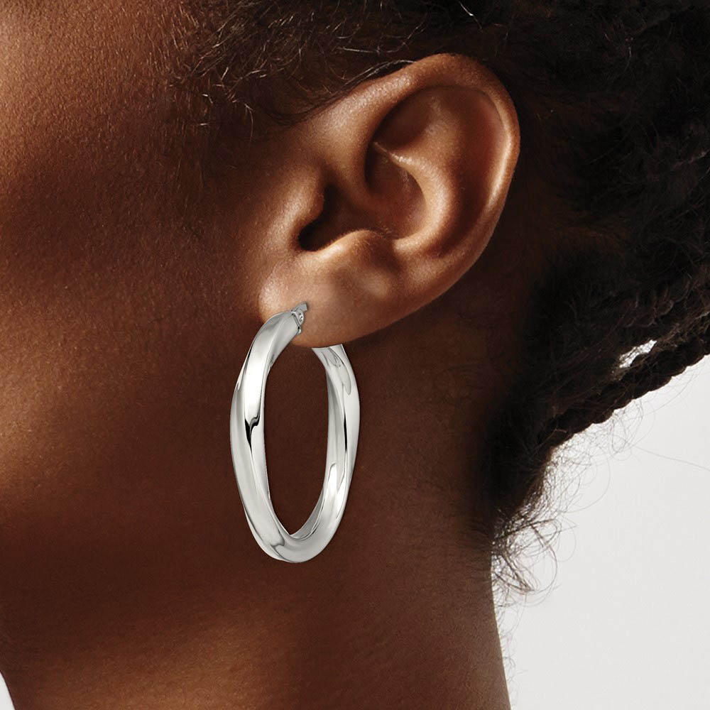 Alternate view of the Stainless Steel Twisted Polished Hollow Round Hoop Earrings, 7 x 37mm by The Black Bow Jewelry Co.