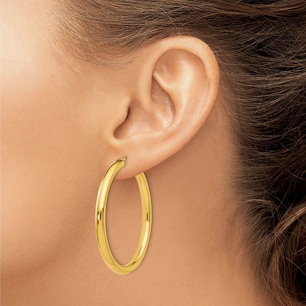 Alternate view of the 3.5mm Round Tube Hoop Earrings in Yellow Gold Tone Silver, 42mm by The Black Bow Jewelry Co.