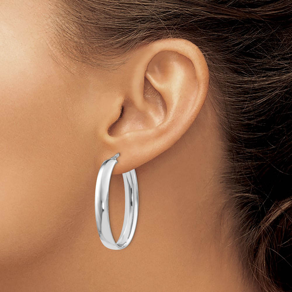 Alternate view of the 6mm Polished Oval Hoop Earrings in Sterling Silver, 33mm (1 1/4 in) by The Black Bow Jewelry Co.
