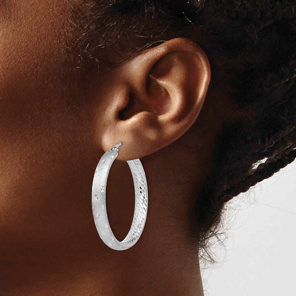 Alternate view of the 5mm Diamond-Cut Sterling Silver Round Hoop Earrings, 39mm (1 1/2 in) by The Black Bow Jewelry Co.
