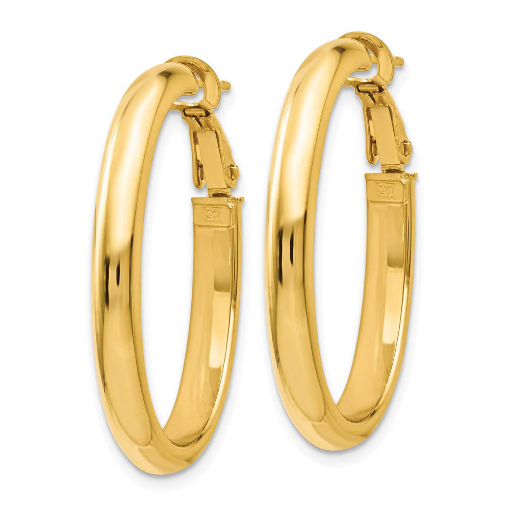 Alternate view of the 4mm Omega Back Oval Hoop Earrings in 14k Yellow Gold, 30mm by The Black Bow Jewelry Co.