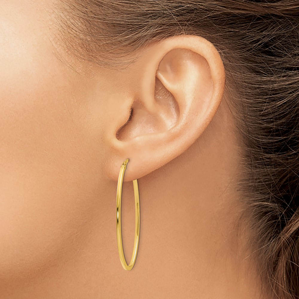Alternate view of the 1.5mm Square Tube Oval Hoop Earrings in 14k Yellow Gold, 40mm by The Black Bow Jewelry Co.