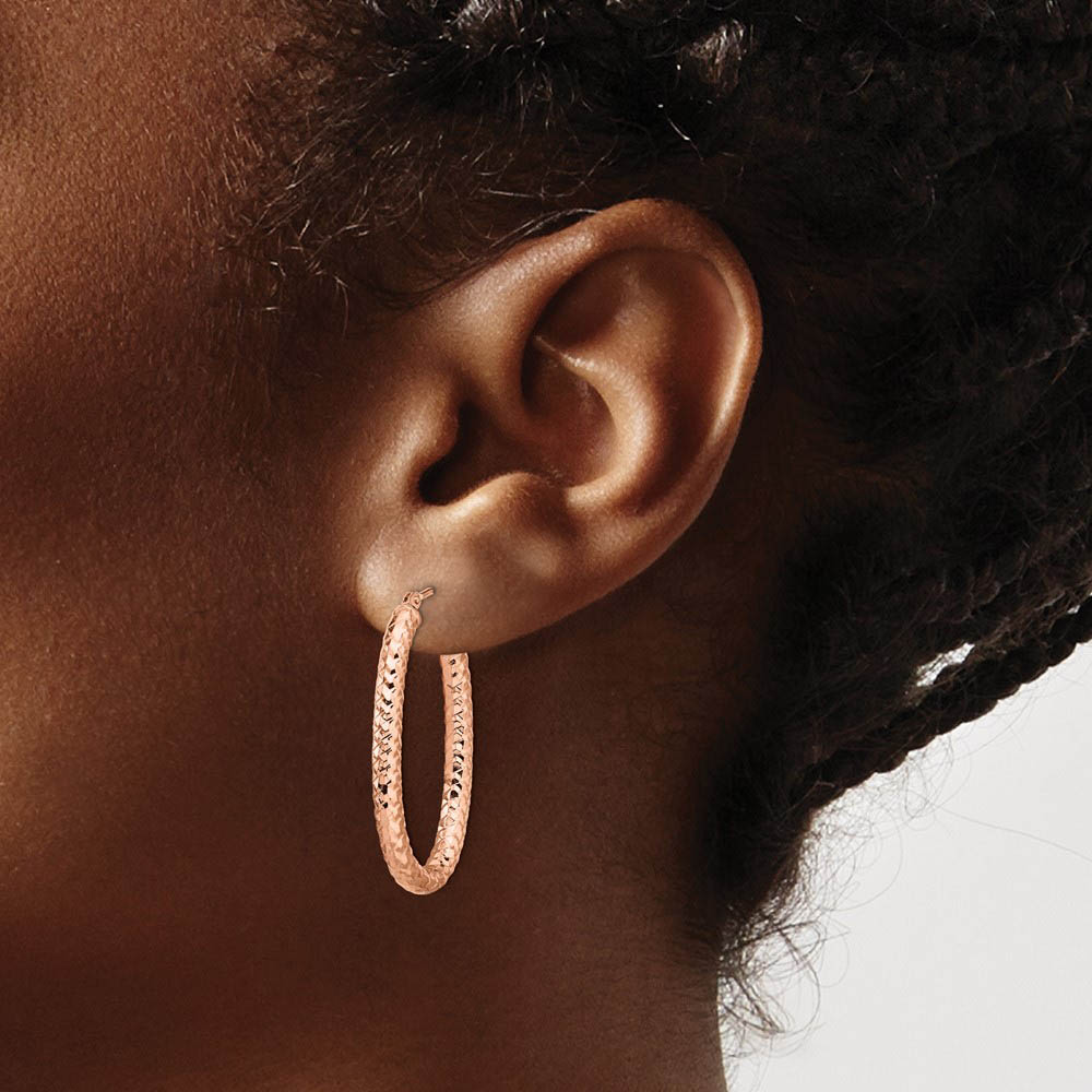 Alternate view of the 3mm Crisscross Oval Hoop Earrings in 14k Rose Gold, 32mm (1 1/4 Inch) by The Black Bow Jewelry Co.