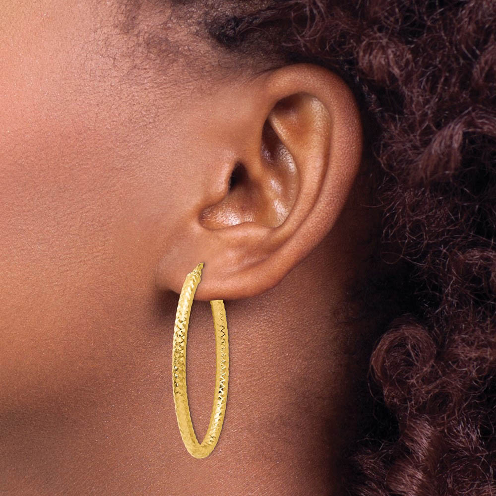 Alternate view of the 3mm Crisscross Oval Hoop Earrings in 14k Yellow Gold, 42mm(1 5/8 Inch) by The Black Bow Jewelry Co.