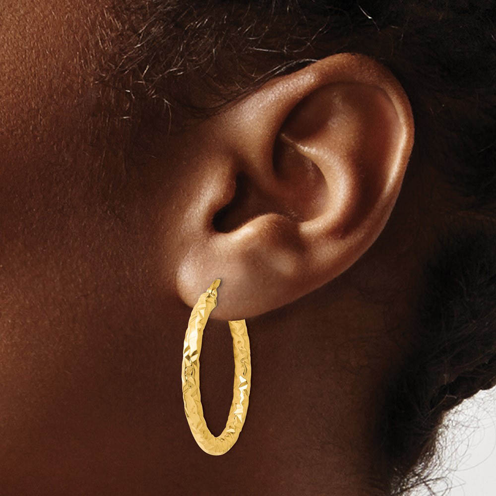 Alternate view of the 3mm Textured Round Hoop Earrings in 14k Yellow Gold, 30mm(1 3/16 Inch) by The Black Bow Jewelry Co.