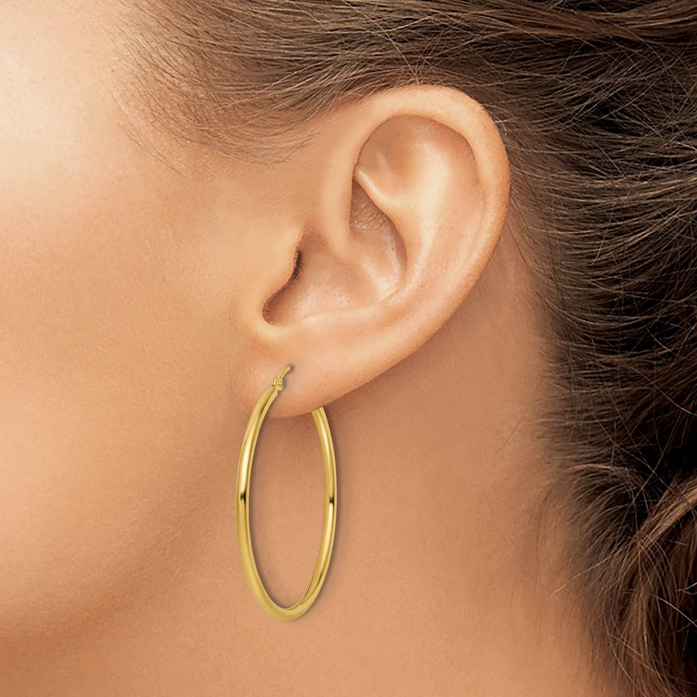 Alternate view of the 2mm Round Hoop Earrings in 10k Yellow Gold, 40mm (1 1/2 Inch) by The Black Bow Jewelry Co.