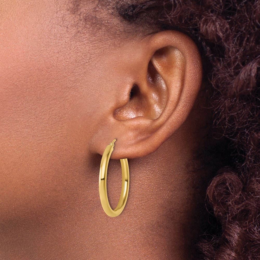 Alternate view of the 3mm Round Hoop Earrings in 10k Yellow Gold, 30mm (1 3/16 Inch) by The Black Bow Jewelry Co.
