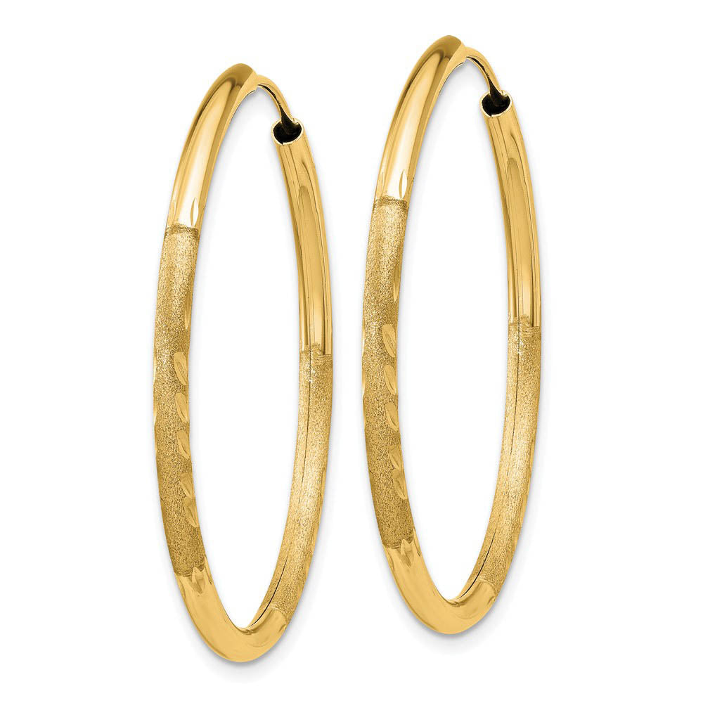 Alternate view of the 2mm x 34mm 14k Yellow Gold Satin Diamond-Cut Endless Hoop Earrings by The Black Bow Jewelry Co.