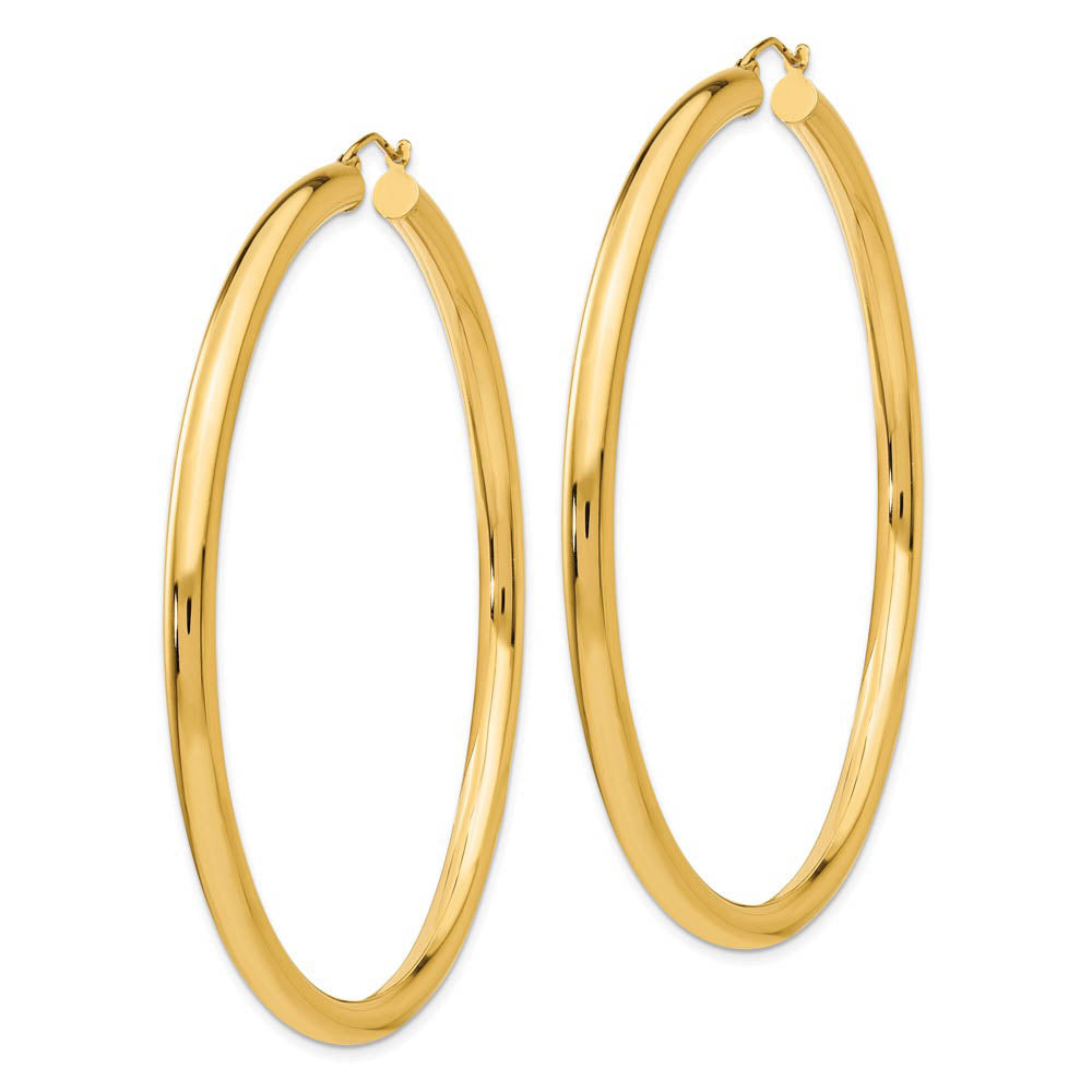 Alternate view of the 4mm x 70mm 14k Yellow Gold Polished Round Hoop Earrings by The Black Bow Jewelry Co.