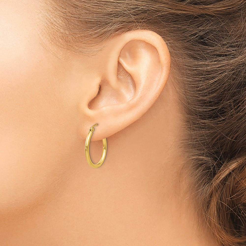 Alternate view of the 2mm x 20mm 14k Yellow Gold Classic Round Hoop Earrings by The Black Bow Jewelry Co.