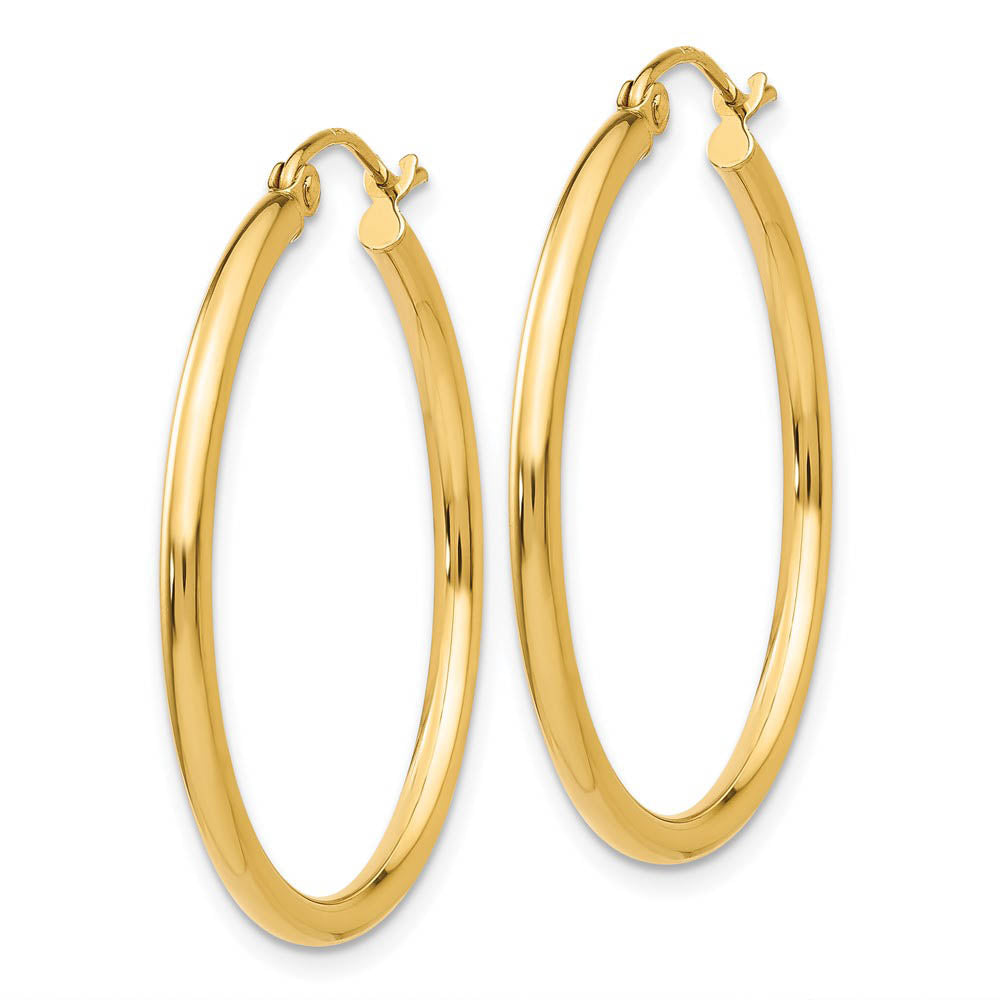 Alternate view of the 2mm x 30mm 14k Yellow Gold Classic Round Hoop Earrings by The Black Bow Jewelry Co.