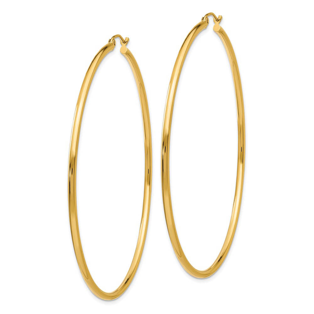 Alternate view of the 2mm x 65mm 14k Yellow Gold Classic Round Hoop Earrings by The Black Bow Jewelry Co.