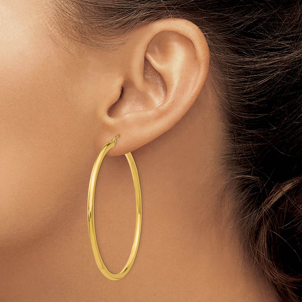 Alternate view of the 2.5mm x 55mm 14k Yellow Gold Classic Round Hoop Earrings by The Black Bow Jewelry Co.