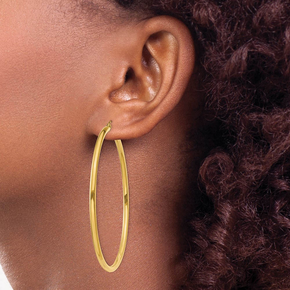 Alternate view of the 2.5mm x 60mm 14k Yellow Gold Classic Round Hoop Earrings by The Black Bow Jewelry Co.