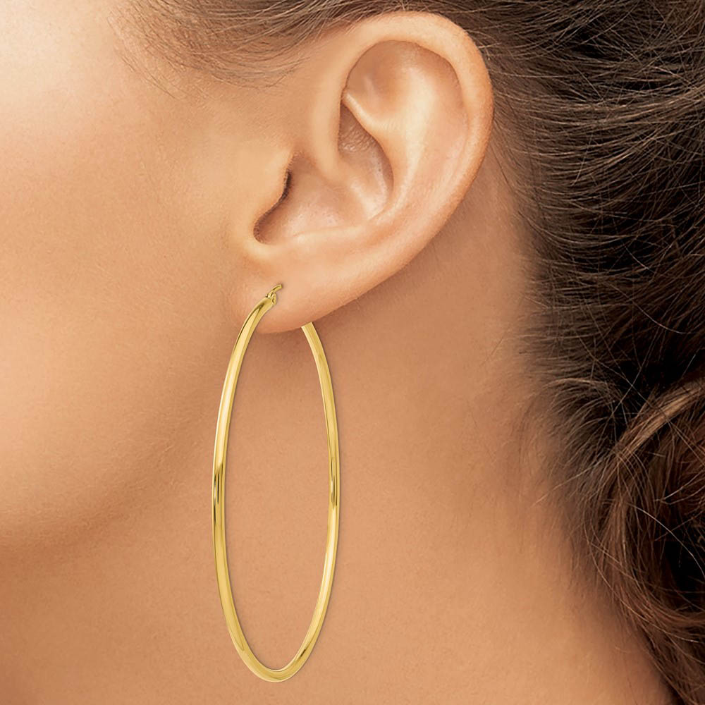 Alternate view of the 2.5mm x 65mm 14k Yellow Gold Classic Round Hoop Earrings by The Black Bow Jewelry Co.