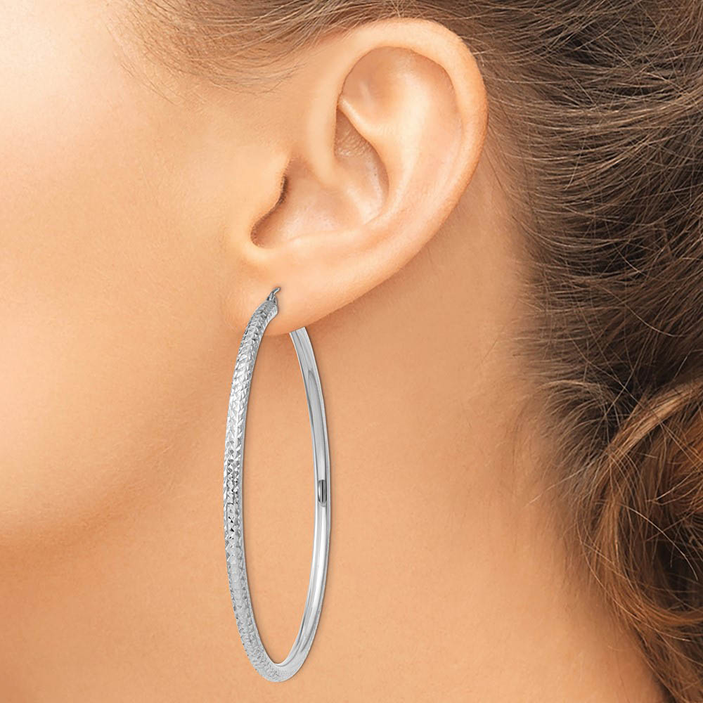 Alternate view of the 3mm x 65mm, 14k White Gold, Diamond-cut Round Hoop Earrings by The Black Bow Jewelry Co.