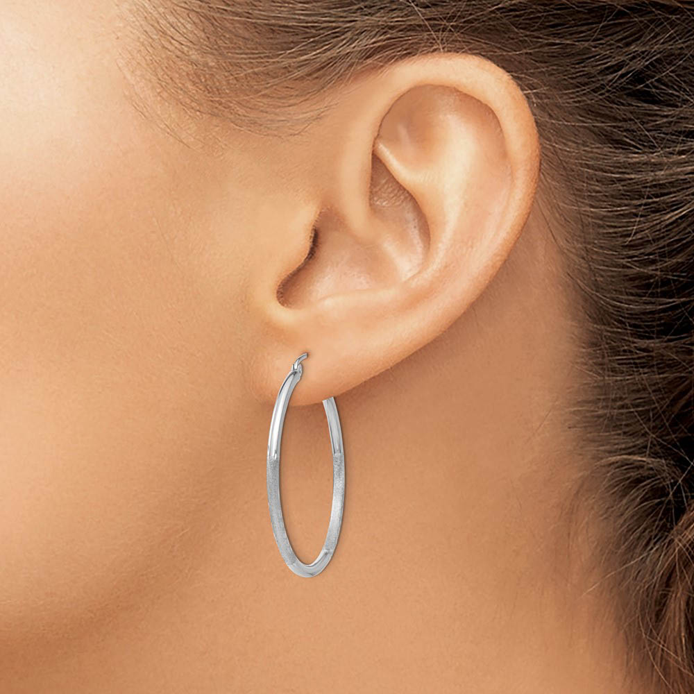 Alternate view of the 2mm x 35mm 14k White Gold Satin & Diamond-Cut Round Hoop Earrings by The Black Bow Jewelry Co.
