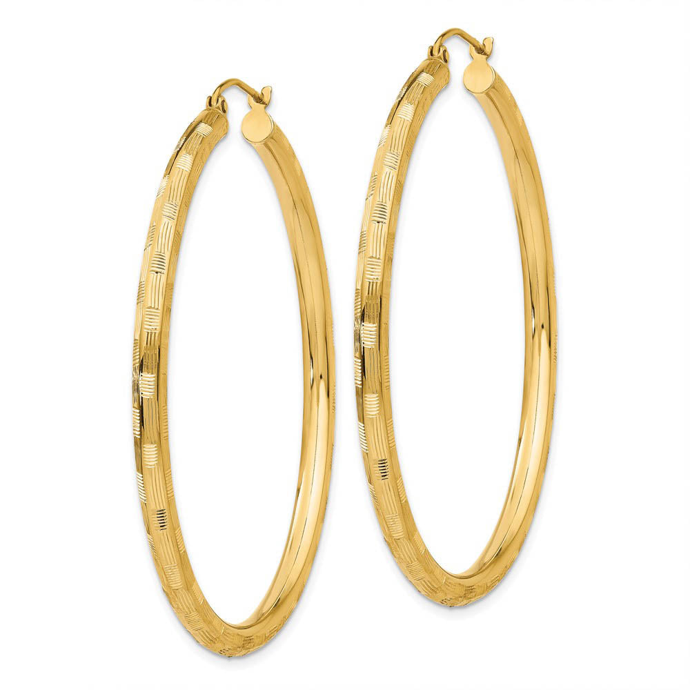 Alternate view of the 3mm x 50mm 14k Yellow Gold Textured Round Hoop Earrings by The Black Bow Jewelry Co.