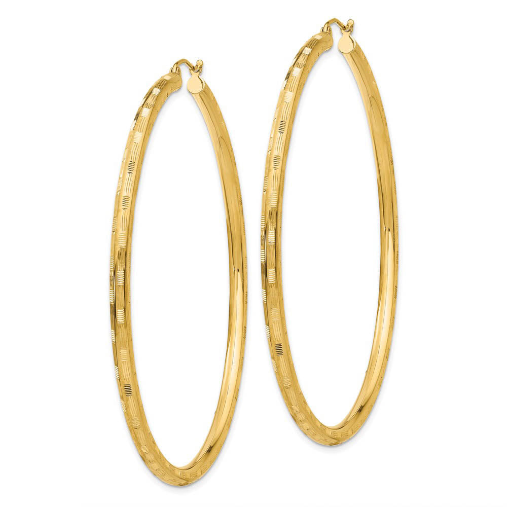 Alternate view of the 3mm x 65mm 14k Yellow Gold Textured Round Hoop Earrings by The Black Bow Jewelry Co.