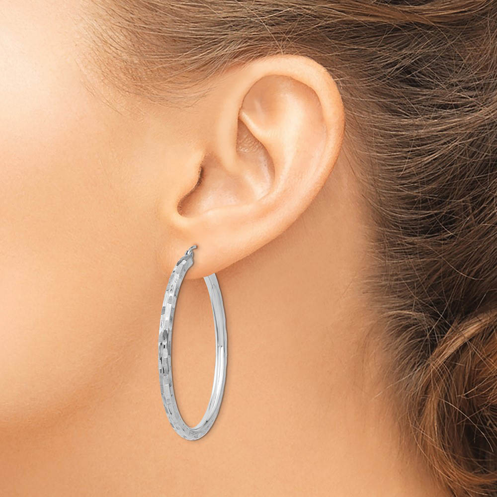 Alternate view of the 3mm x 60mm 14k White Gold Textured Round Hoop Earrings by The Black Bow Jewelry Co.