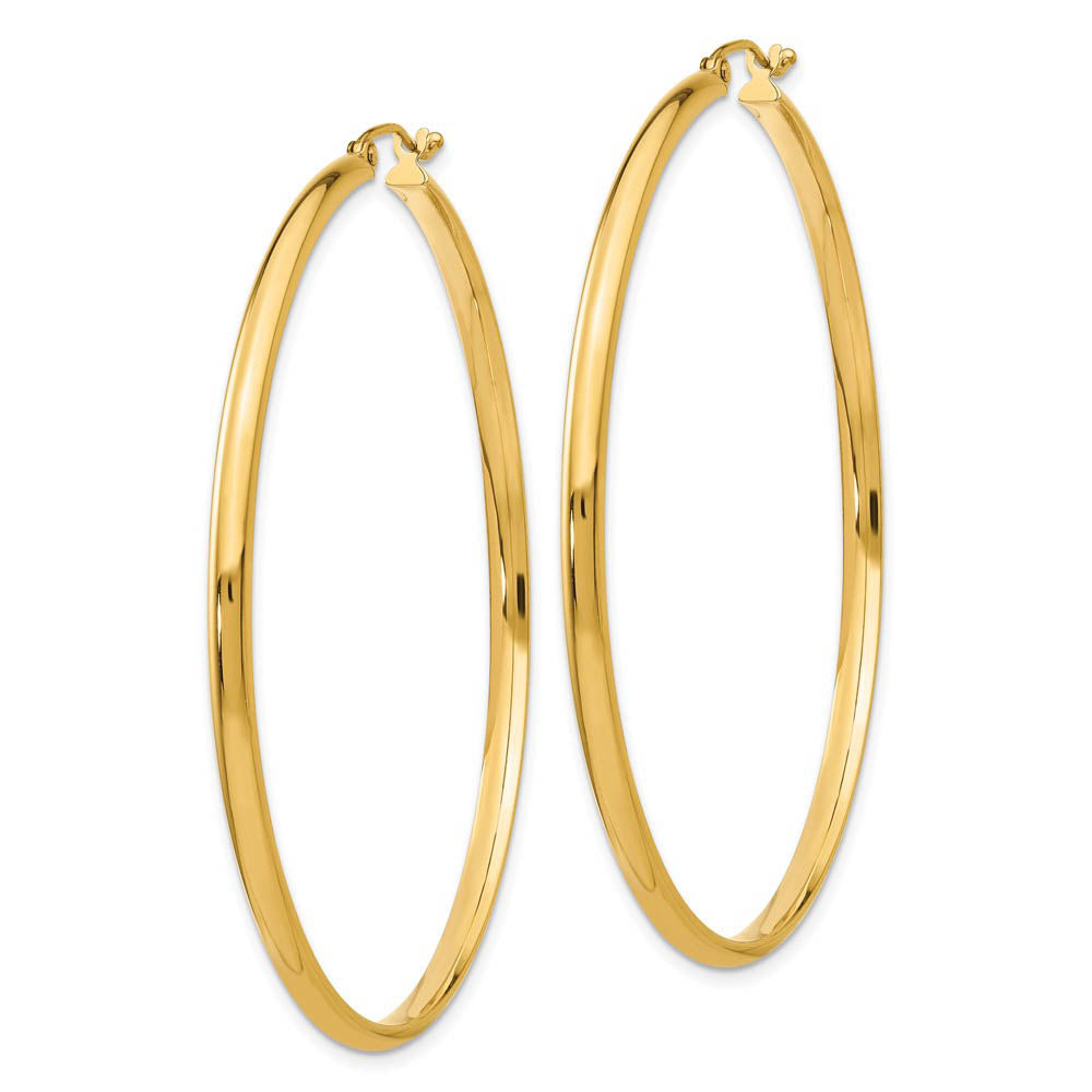 Alternate view of the 2.75mm x 56mm Polished 14k Yellow Gold Domed Round Hoop Earrings by The Black Bow Jewelry Co.