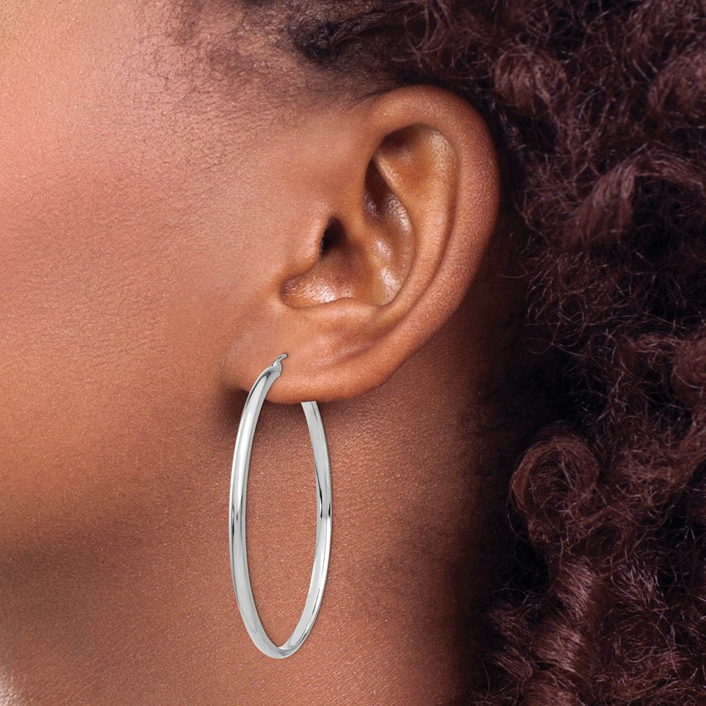 Alternate view of the 2.75mm x 50mm Polished 14k White Gold Domed Round Hoop Earrings by The Black Bow Jewelry Co.