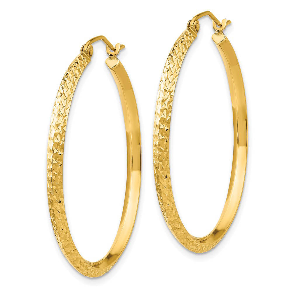 Alternate view of the 2.5mm x 35mm 14k Yellow Gold Knife Edge Diamond-Cut Round Hoops by The Black Bow Jewelry Co.