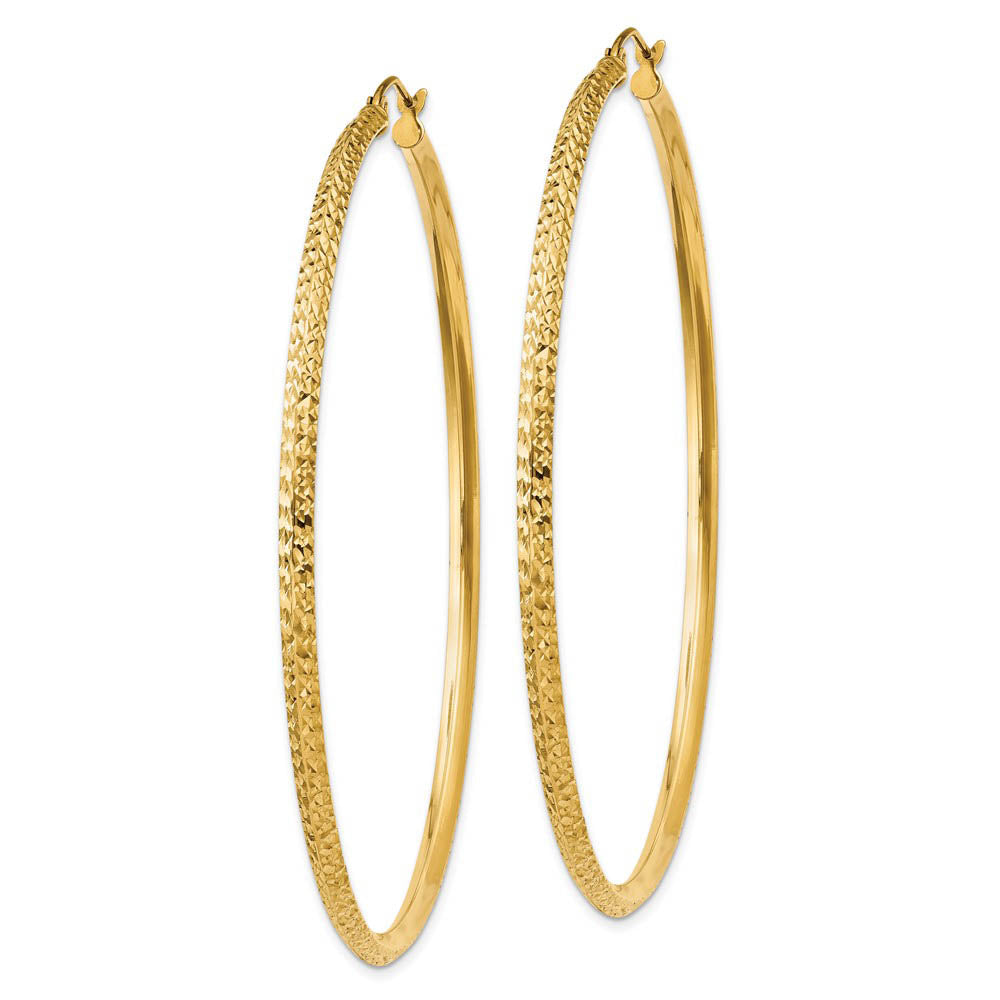 Alternate view of the 2.5mm x 65mm 14k Yellow Gold Knife Edge Diamond-Cut Round Hoops by The Black Bow Jewelry Co.
