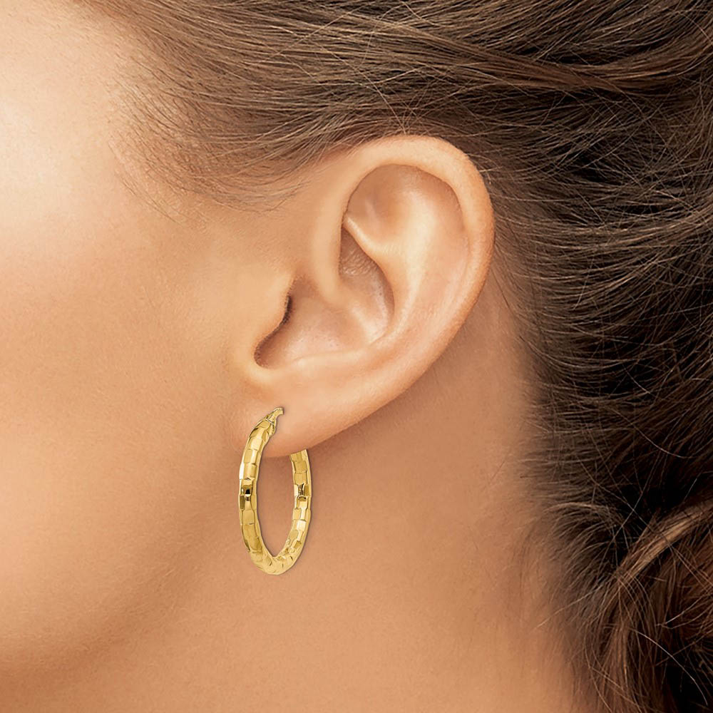 Alternate view of the 4mm x 21mm Polished 14k Yellow Gold Hollow Twisted Round Hoop Earrings by The Black Bow Jewelry Co.