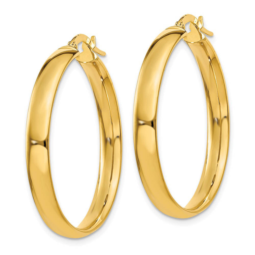 Alternate view of the 4mm x 28mm Polished 14k Yellow Gold Round Hoop Earrings by The Black Bow Jewelry Co.
