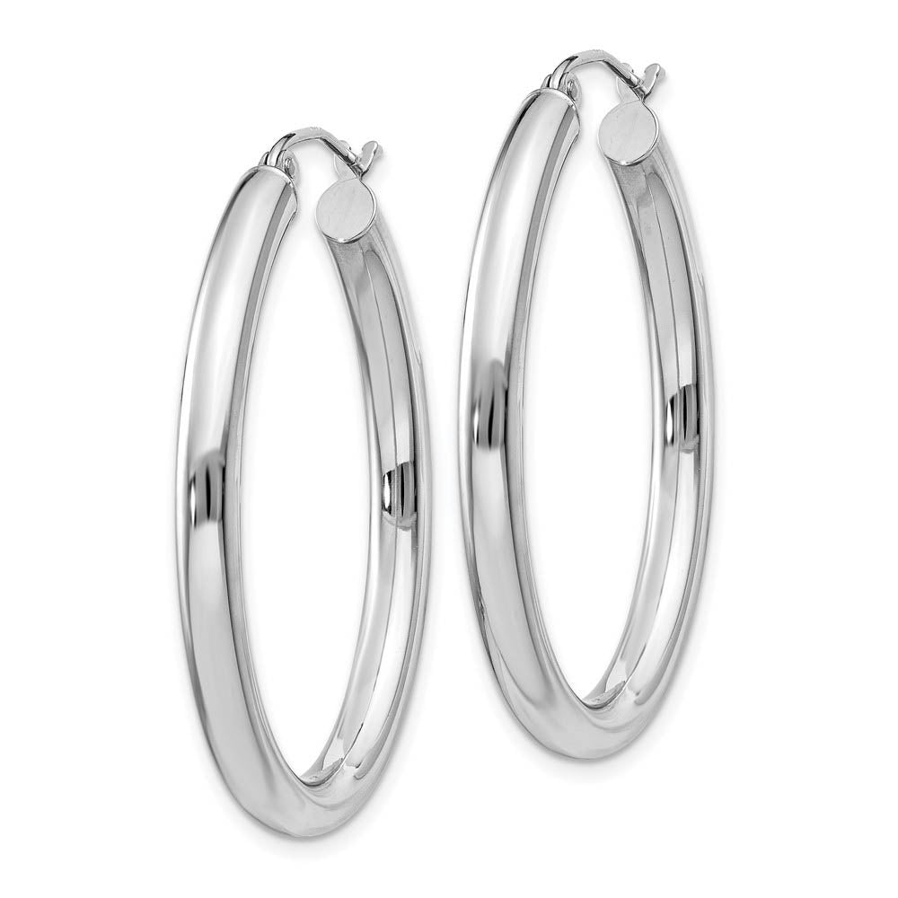 Alternate view of the 3.5mm x 38mm Polished 14k White Gold Classic Oval Tube Hoop Earrings by The Black Bow Jewelry Co.