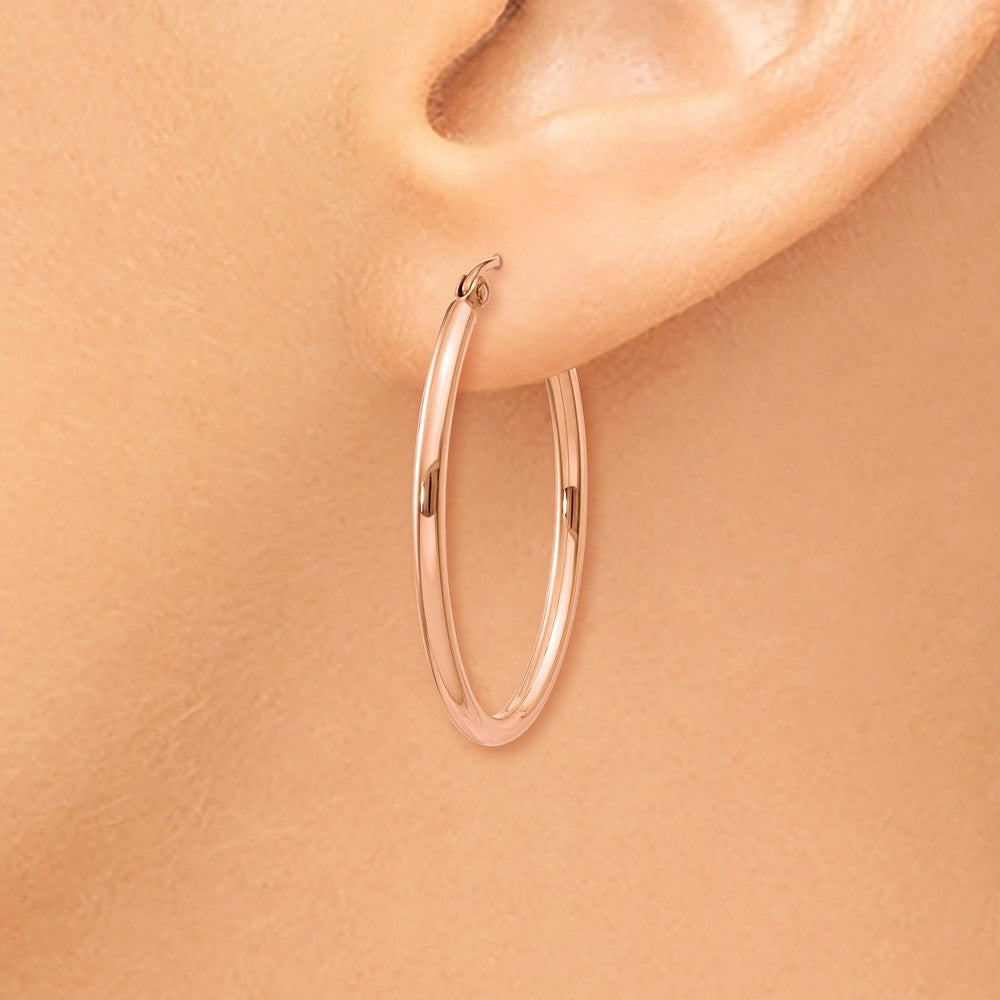 Alternate view of the 2mm x 30mm Polished 14k Rose Gold Classic Oval Hoop Earrings by The Black Bow Jewelry Co.