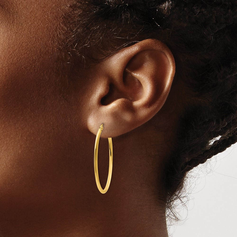 Alternate view of the 2mm x 35mm (1 3/8 Inch) Polished 14k Yellow Gold Point Edge Oval Hoops by The Black Bow Jewelry Co.