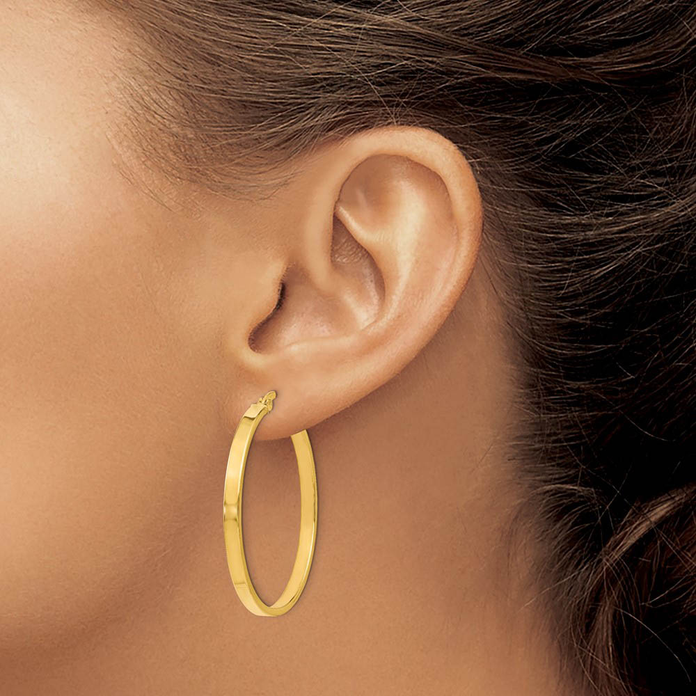 Alternate view of the 3mm x 38mm (1 1/2 Inch) Polished 14k Yellow Gold Flat Edge Round Hoops by The Black Bow Jewelry Co.