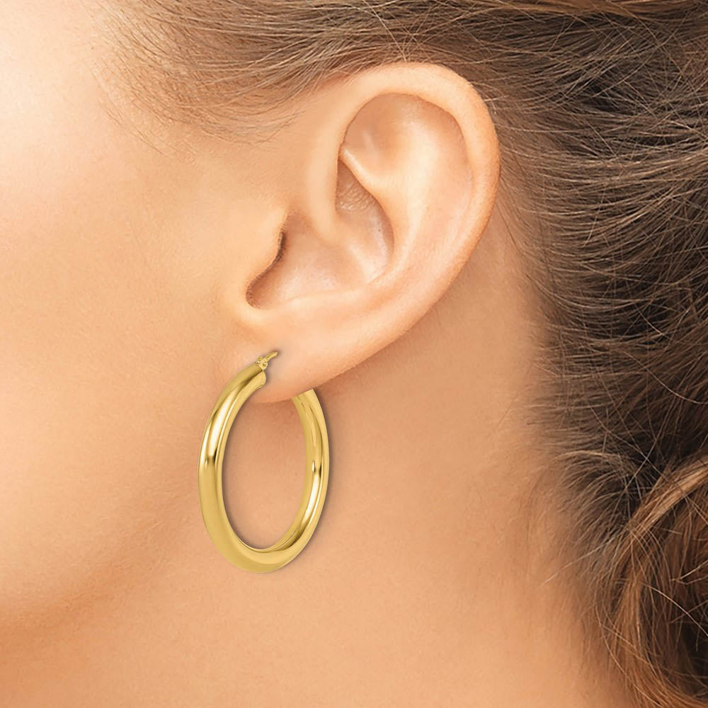 Alternate view of the 4mm x 34mm (1 5/16 Inch) 14k Yellow Gold Classic Round Hoop Earrings by The Black Bow Jewelry Co.