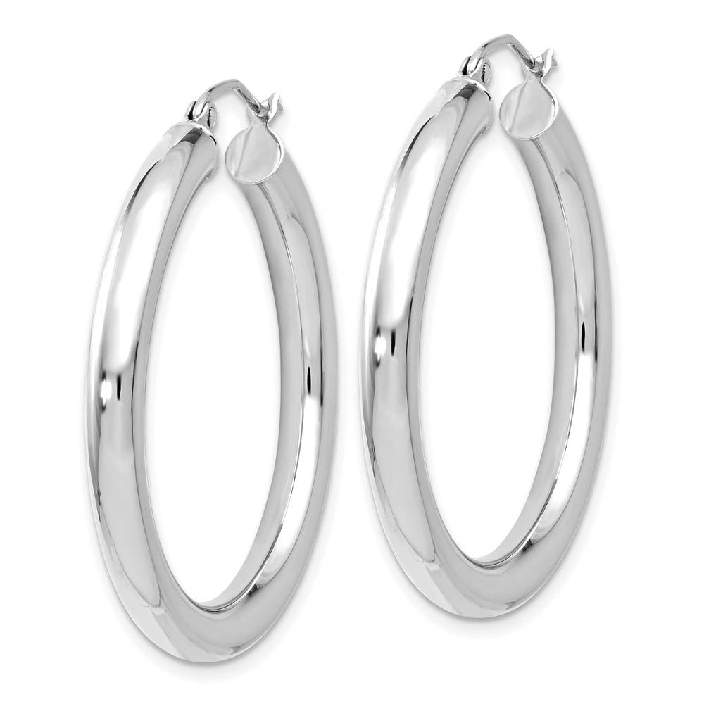 Alternate view of the 4mm x 34mm (1 5/16 Inch) 14k White Gold Classic Round Hoop Earrings by The Black Bow Jewelry Co.