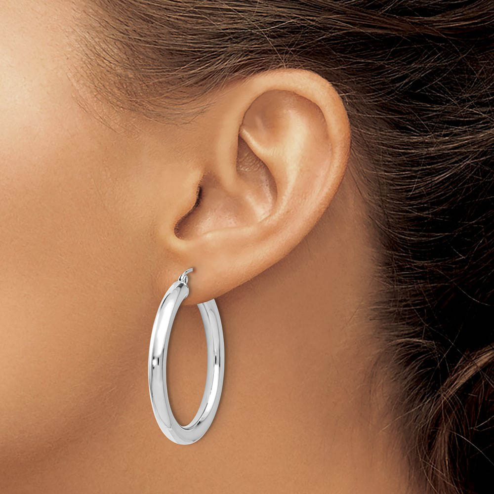 Alternate view of the 4mm x 34mm (1 5/16 Inch) 14k White Gold Classic Round Hoop Earrings by The Black Bow Jewelry Co.