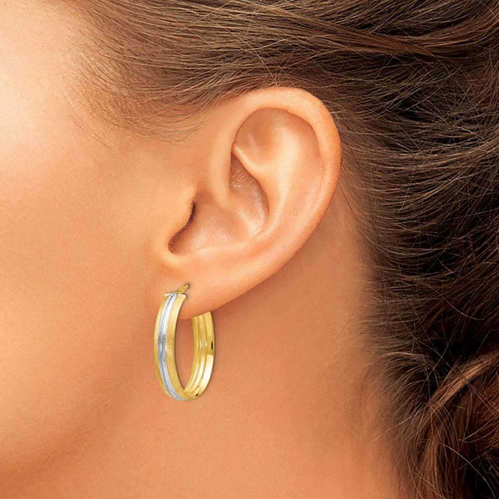 Alternate view of the 5.5mm x 27mm (1 1/16 Inch) 14k Yellow Gold & White Rhodium Oval Hoops by The Black Bow Jewelry Co.