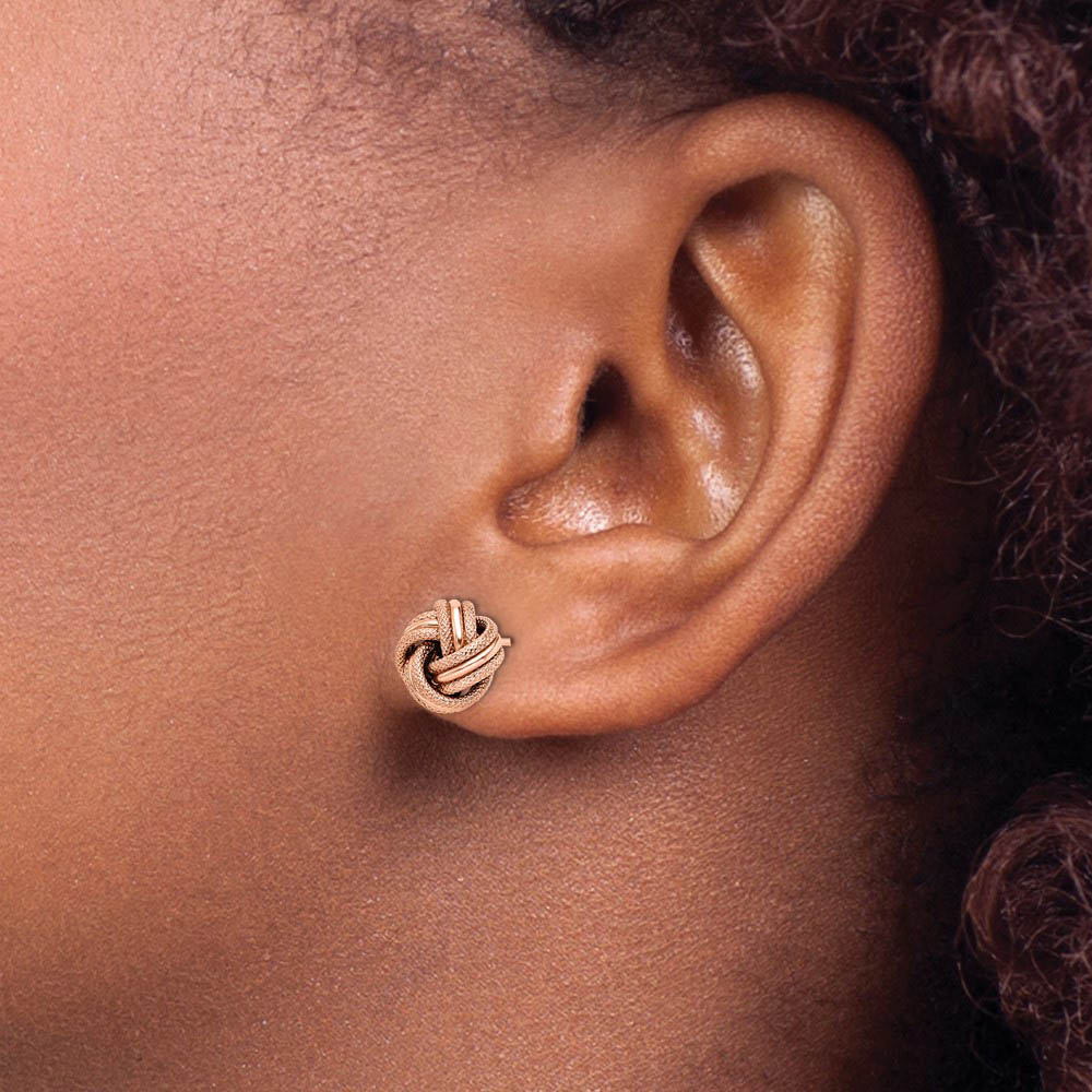 Alternate view of the 8.5mm (5/16 in) 14k Rose Gold Polished & Textured Love Knot Earrings by The Black Bow Jewelry Co.