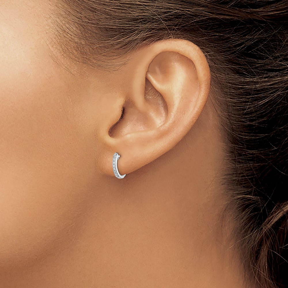 Alternate view of the 1/10 Cttw Diamond Huggie Round Hoop Earrings in Sterling Silver - 10mm by The Black Bow Jewelry Co.